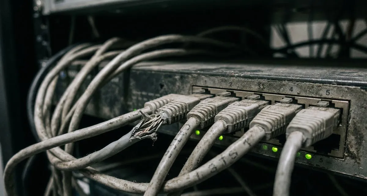 Dark server room with LED lights — SME IT infrastructure in need of a managed IT services contract