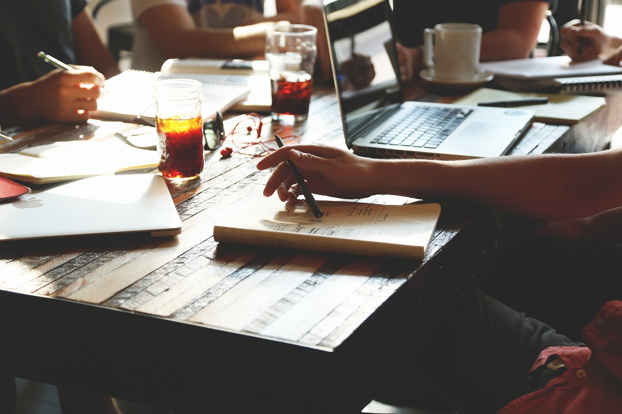 Nonprofit meeting with laptops — managed IT for associations